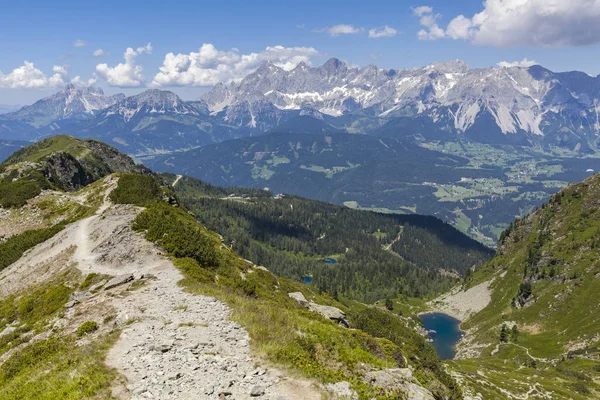 Trail from mountain Gasselhoehe to Rippetegg with lakes and Dachstein