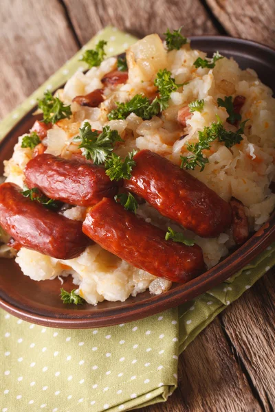 Dutch cuisine: stamppot from potatoes, sauerkraut and carrot clo — Stock Photo, Image