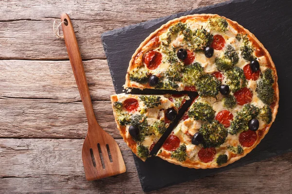 Savory Pie: Sliced Quiche with chicken, broccoli, tomatoes and o