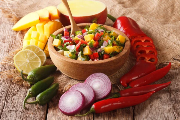Mexican Food: salsa with mango, cilantro, onions and peppers clo