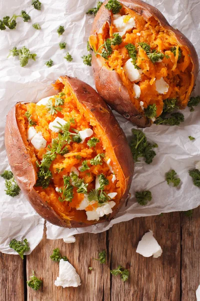 Delicious baked sweet potatoes stuffed with feta cheese and pars — Stock Photo, Image