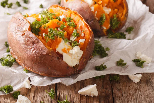 Healthy food: baked sweet potato stuffed with cheese and parsley — Stock Photo, Image