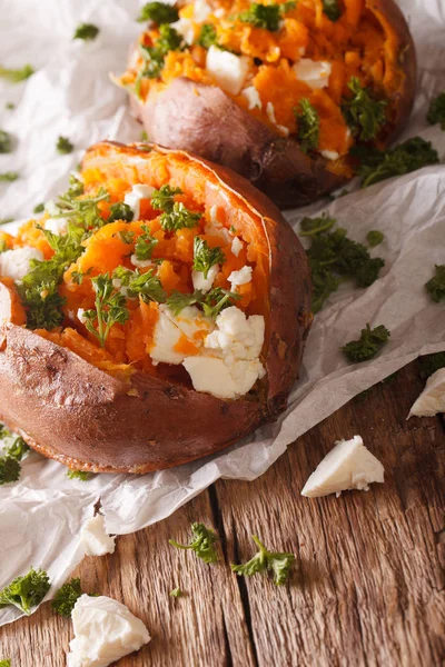 Healthy food: baked sweet potato stuffed with cheese and parsley — Stock Photo, Image
