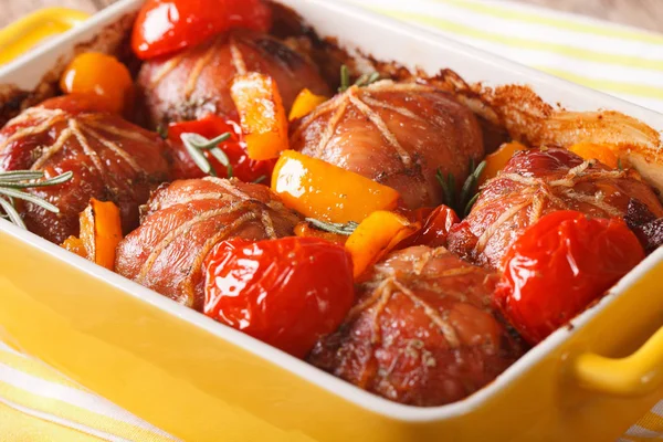 Rabbit fillet baked with tomato and pepper close up. horizontal — Stock Photo, Image