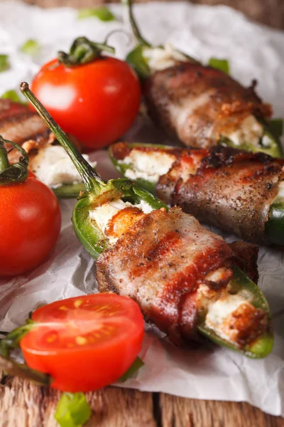 Roasted jalapeno peppers stuffed with cheese wrapped in bacon cl — Stock Photo, Image
