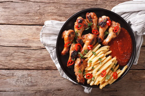 Delicious barbecue chicken wings with french fries and ketchup c — Stock Photo, Image