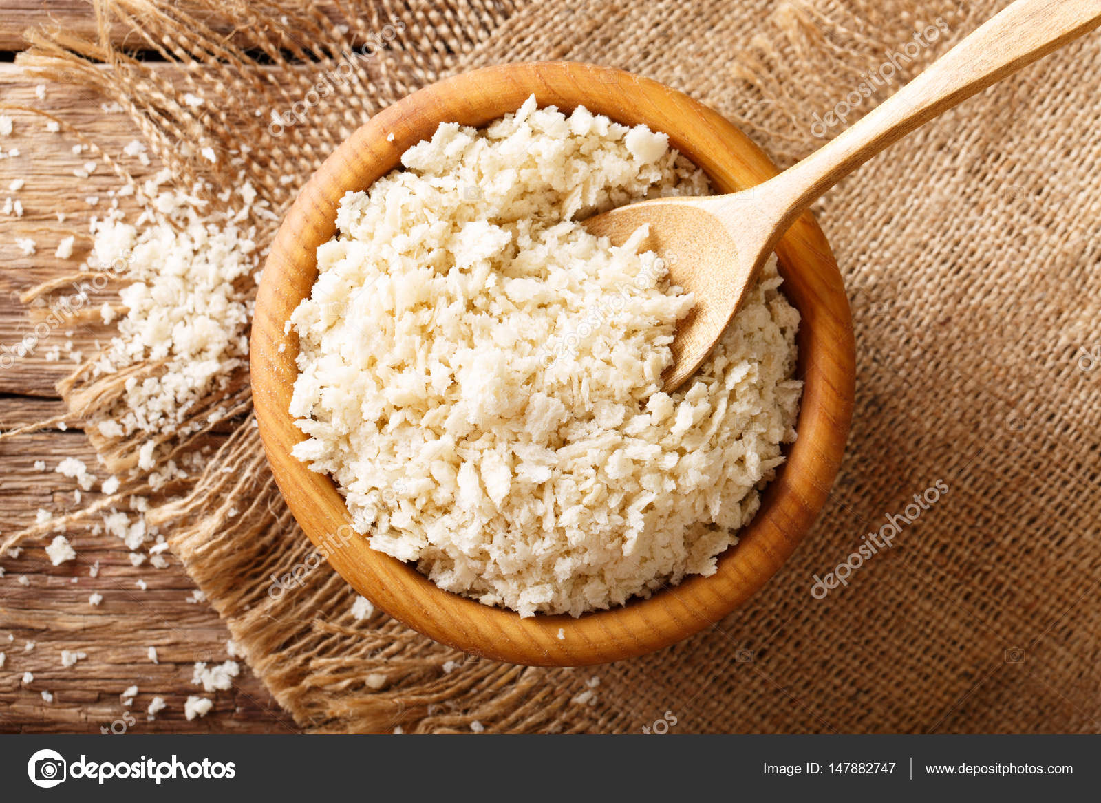 Japanese breadcrumbs Panko for breading in a bowl on a table clo Stock