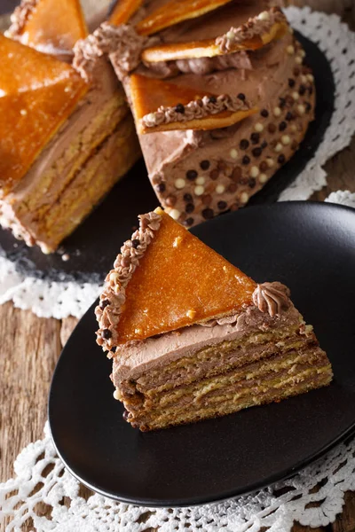 Homemade slice of Hungarian Dobosh cake with caramel close-up. V — Stock Photo, Image