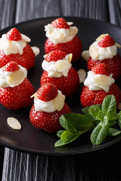 Christmas Strawberry Dessert stuffed with whipped cream. — Stock Photo, Image