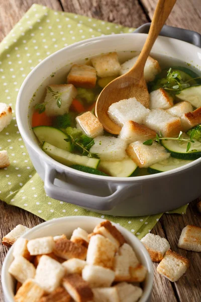 Bread soup with summer vegetables close-up in a bowl. vertical — Stock Photo, Image