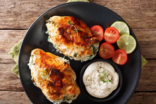 Delicious food: Baked chicken fillet stuffed with cheese and spi