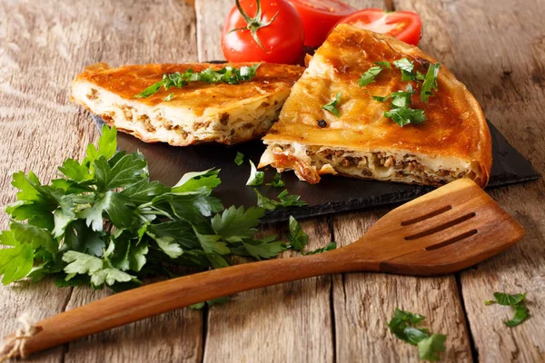 Delicious hot burek with minced meat close-up. horizontal — Stock Photo, Image