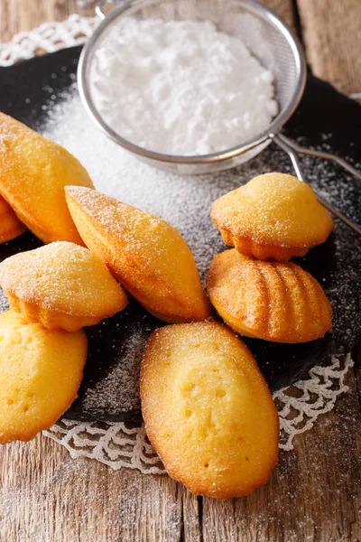 Delicious French Madeleine Cookies close-up on an table. vertica — Stock Photo, Image