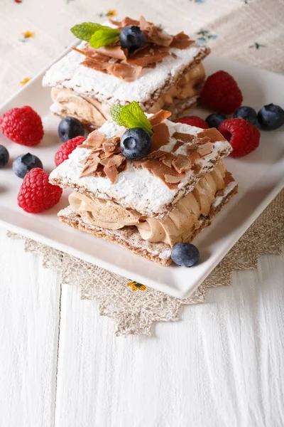 Delicious chocolate millefeuille with raspberry and blueberry cl — Stock Photo, Image