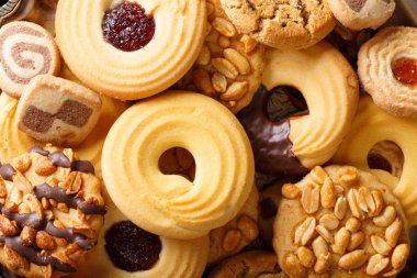 Tatlı lezzetli kurabiyeler çeşitli yakın çekim. Arka plan yatay