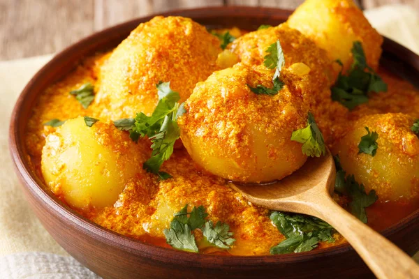 Kashmiri dum aloo: spicy potato closeup on the pan. Horizontal — Stock Photo, Image