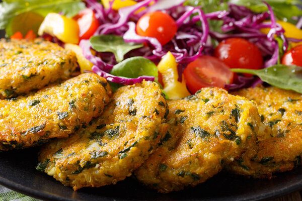 Dietary quinoa with spinach burgers and fresh vegetable salad cl