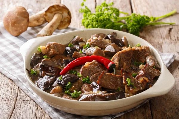 Delicious food: beef stew with wild mushrooms in spicy sauce clo