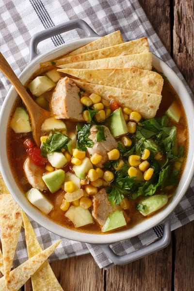 Spicy tortilla soup with chicken, cilantro, tomatoes, avocado an — Stock Image Spicy tortilla soup with chicken, cilantro, tomatoes, avocado an Royalty Free Stock Images