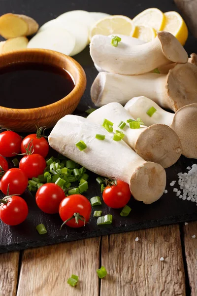 Raw fresh king oyster mushrooms and vegetables, spices and soy s — Stock Photo, Image