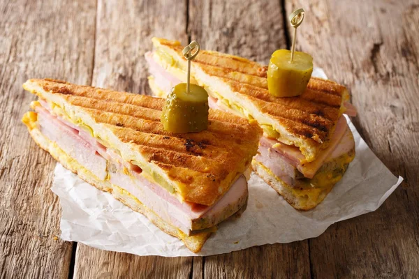 Cuban sandwich with ham, mustard, cheese, pickled and pork close — Stock Photo, Image