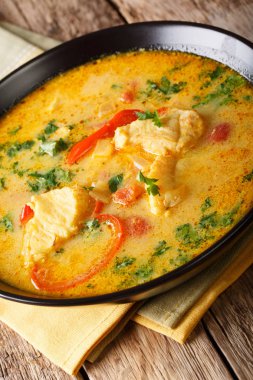 Brazilian food: Moqueca Baiana of fish and bell peppers in spicy clipart