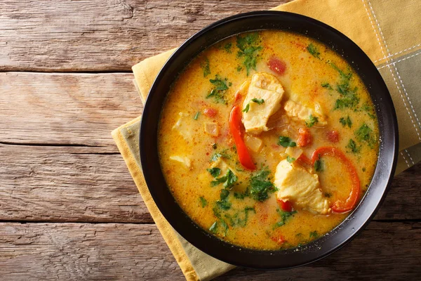 Brazilian food: Moqueca Baiana of fish and bell peppers in spicy — Stock Image Brazilian food: Moqueca Baiana of fish and bell peppers in spicy Royalty Free Stock Images
