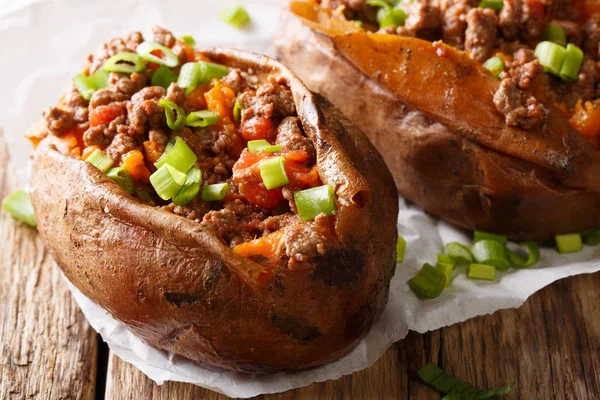 Healthy and tasty food baked sweet potato stuffed with ground be — Stock Photo, Image