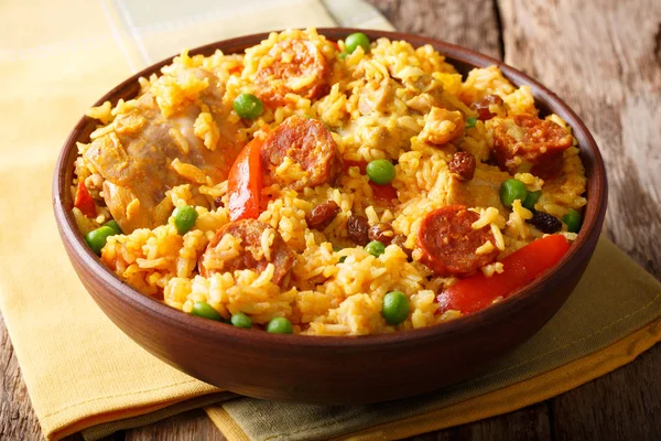 Delicious food: Arroz Valenciana with rice, meat, sausage, raisi — Stock Photo, Image