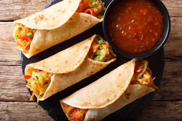 Stock image Indian street vegetarian food: Roti roll stuffed with vegetables