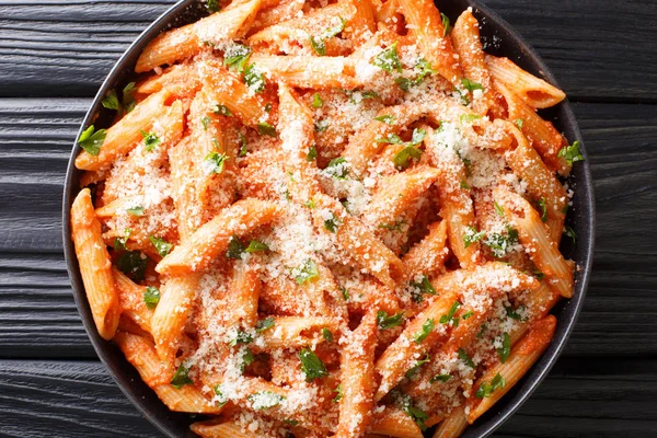 Penne alla vodkais tender pasta tossed in a rich — Stockfoto