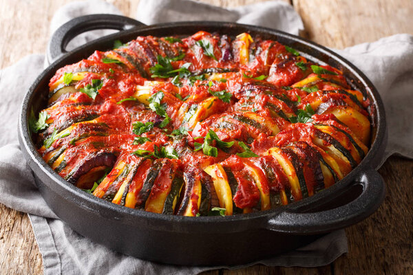 Traditional Greek briam made of vegetables close-up in a pan. ho