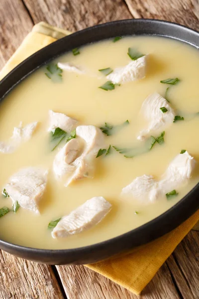 Georgian chicken Chikhirtma close-up in a bowl. vertical — Stock Photo, Image