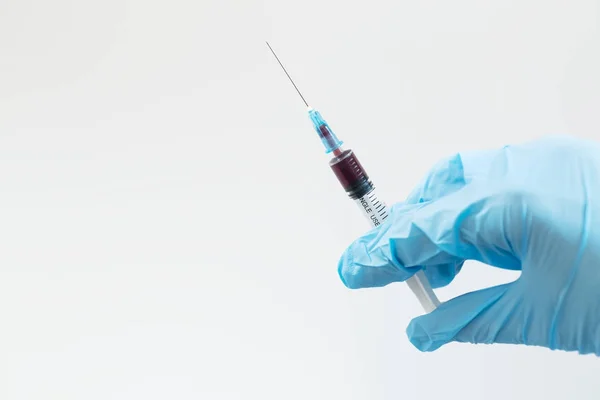 Injection Needle Full Blood Doctors Hand Macro Close — Stock Photo, Image
