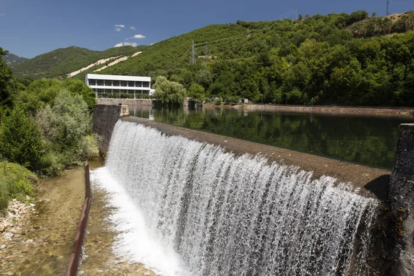 Hydroelectric power plant in warm sunny day