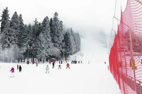 20 JANUARY 2020, BOROVETS SKI RESORT, BULGARIA: People skiing on the slopes. — Stok fotoğraf