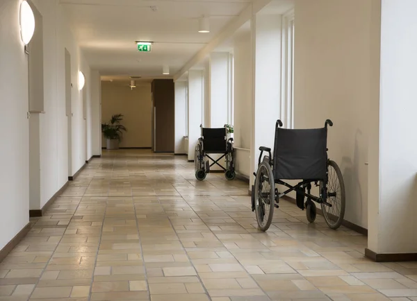 Wheelchair in corridor of hospital — Stock Photo, Image