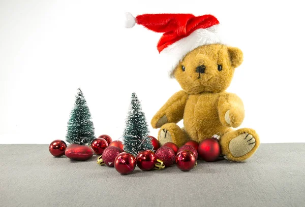 Christmas teddy with tree and balls — Stock Photo, Image