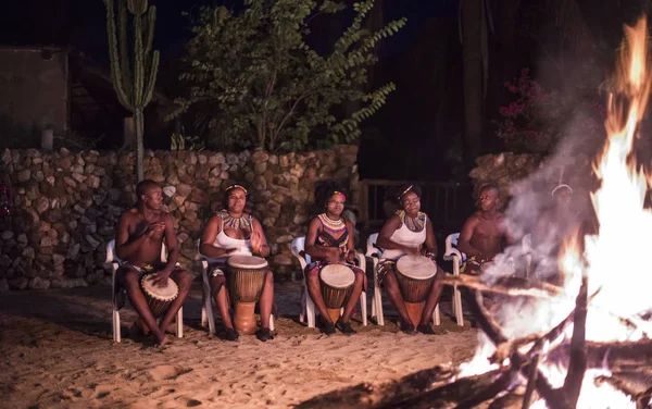 African woman with the bongo drums — Stock Photo, Image