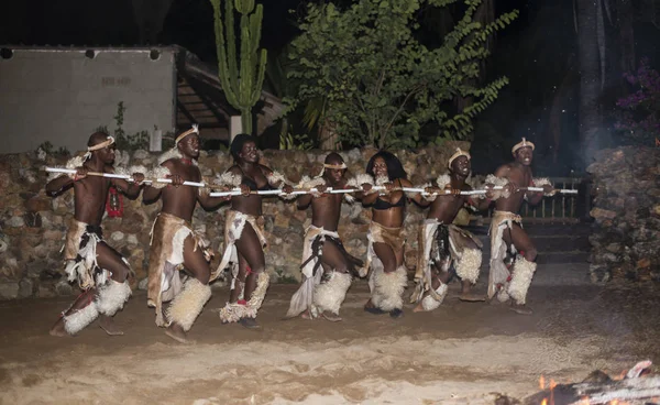 African man and woman dancing in traditional costumes — Stock Photo, Image