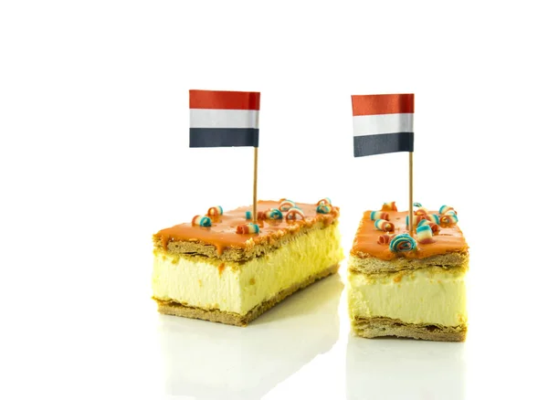 Two orange tompouce with the dutch flag — Stock Photo, Image