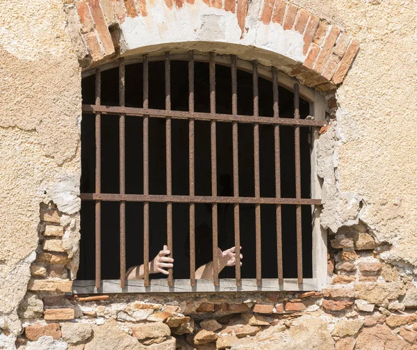 Man behind bars in jail or prison — Stock Photo, Image