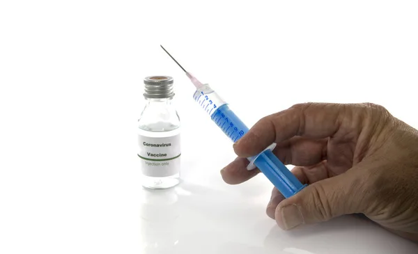 Coronavirus aşısı şişesi ve şırınga. — Stok fotoğraf