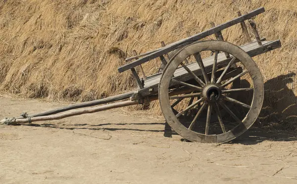 Wooden cart on ground — Stock Photo, Image