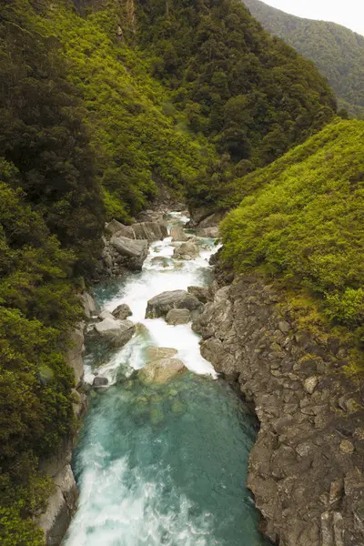 River water going through hills — Stock Photo, Image