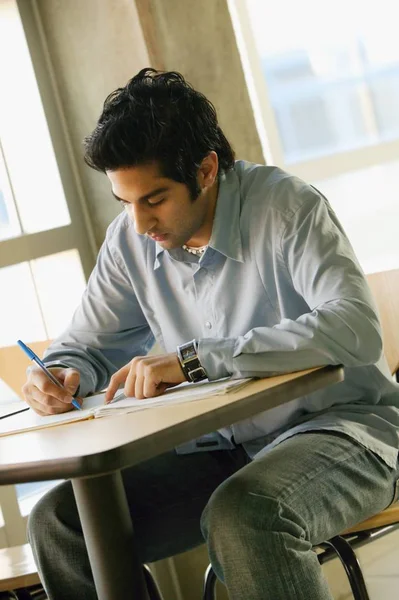 Male Latin Student Writing Notebook Classroom — Stock Photo, Image