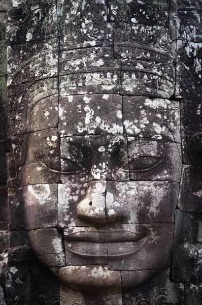 Face sculpture on wall — Stock Photo, Image