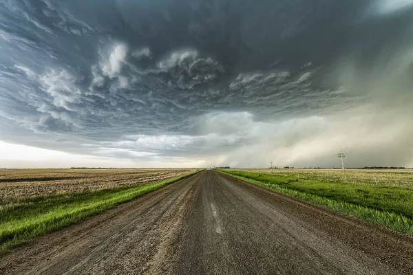 Gravel Road Leading Distance Dramatic Storm Cloud Val Marie Saskatchewan — Φωτογραφία Αρχείου