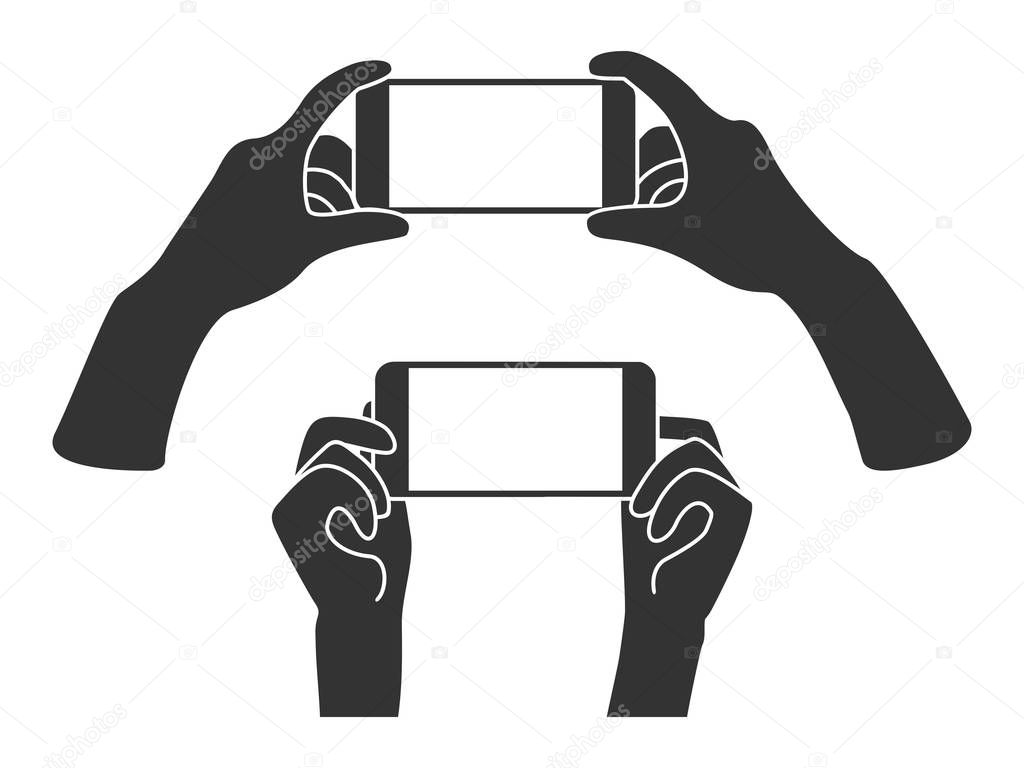 Hands holding phone in horizontal position. Blank screen mobile phone for message or photo.