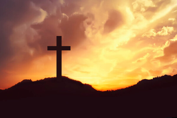 Silhouette of crosses symbol on the mountain peak